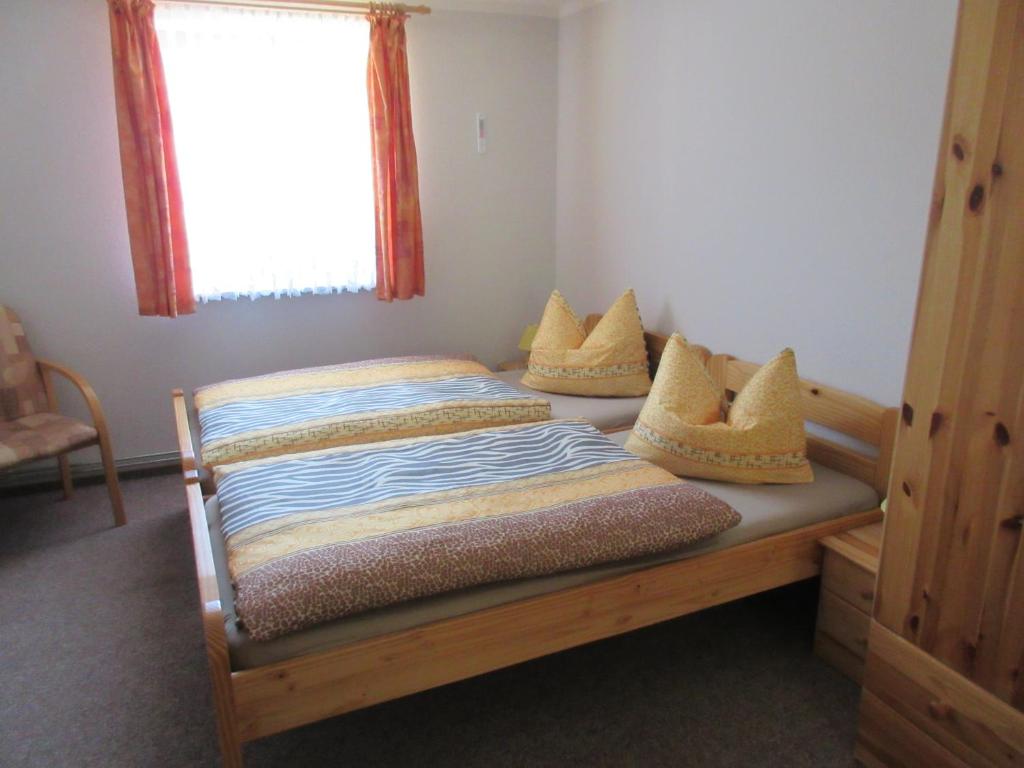 Ένα ή περισσότερα κρεβάτια σε δωμάτιο στο Ferienwohnung Rogge (Stendal)
