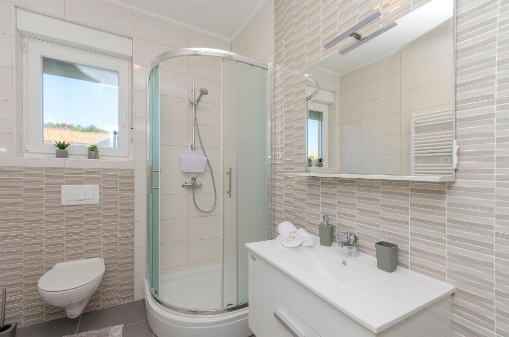 Kúpeľňa v ubytovaní Apartments Luxury and Sea View