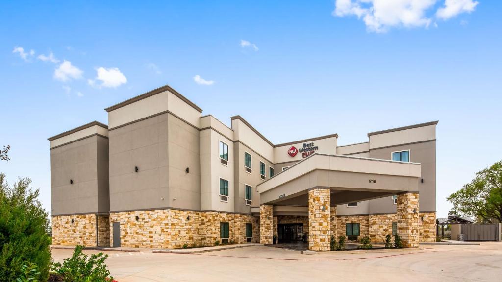 a rendering of the front of a hospital at Best Western Plus Waller Hotel in Waller