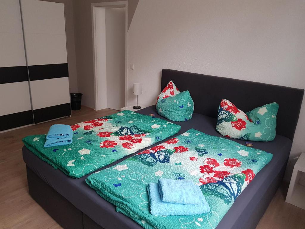 Postel nebo postele na pokoji v ubytování Bed and Breakfast Zeulenroda