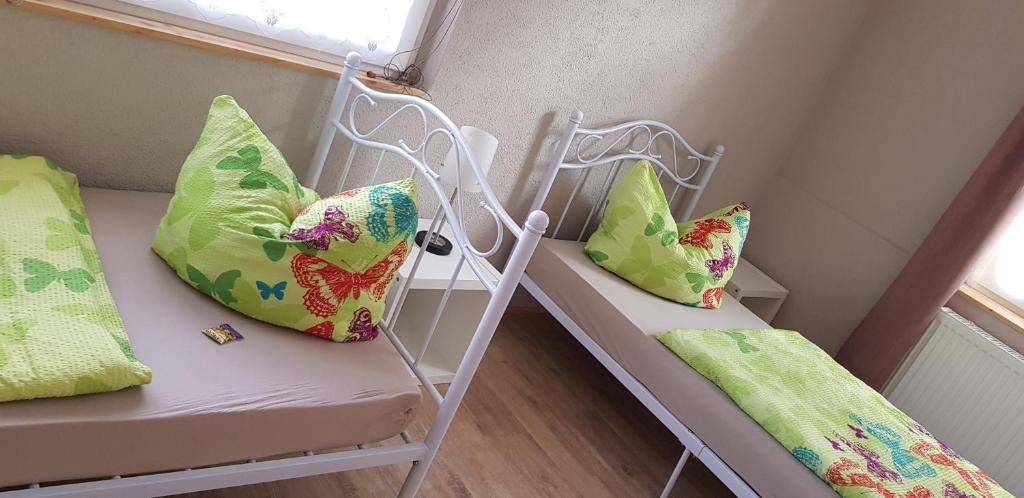 Postel nebo postele na pokoji v ubytování Bed and Breakfast Zeulenroda