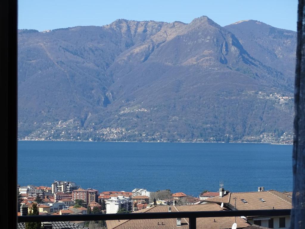 a view of a large body of water and a mountain at Bella Vita in Luino