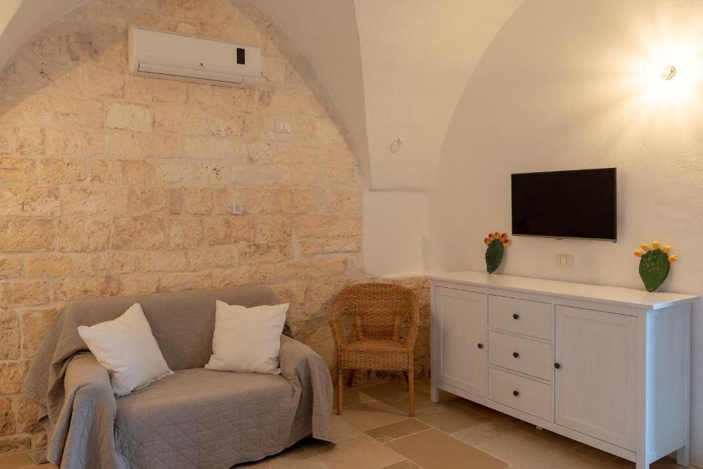 TV a/nebo společenská místnost v ubytování Masseria Pugliese Farm