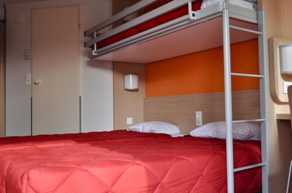Postel nebo postele na pokoji v ubytování Premiere Classe Sete - Balaruc