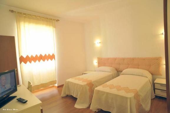 Postel nebo postele na pokoji v ubytování The Whale B&B