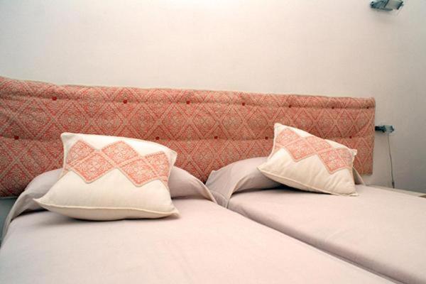 Postel nebo postele na pokoji v ubytování The Whale B&B