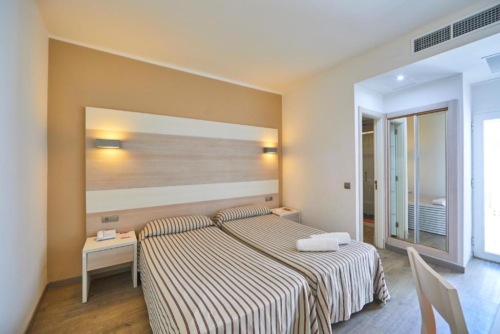 Postel nebo postele na pokoji v ubytování MLL Palma Bay Club Resort