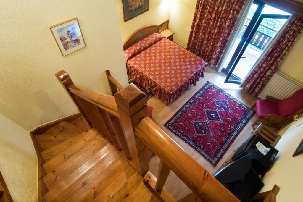 Postel nebo postele na pokoji v ubytování Rutllan & Spa