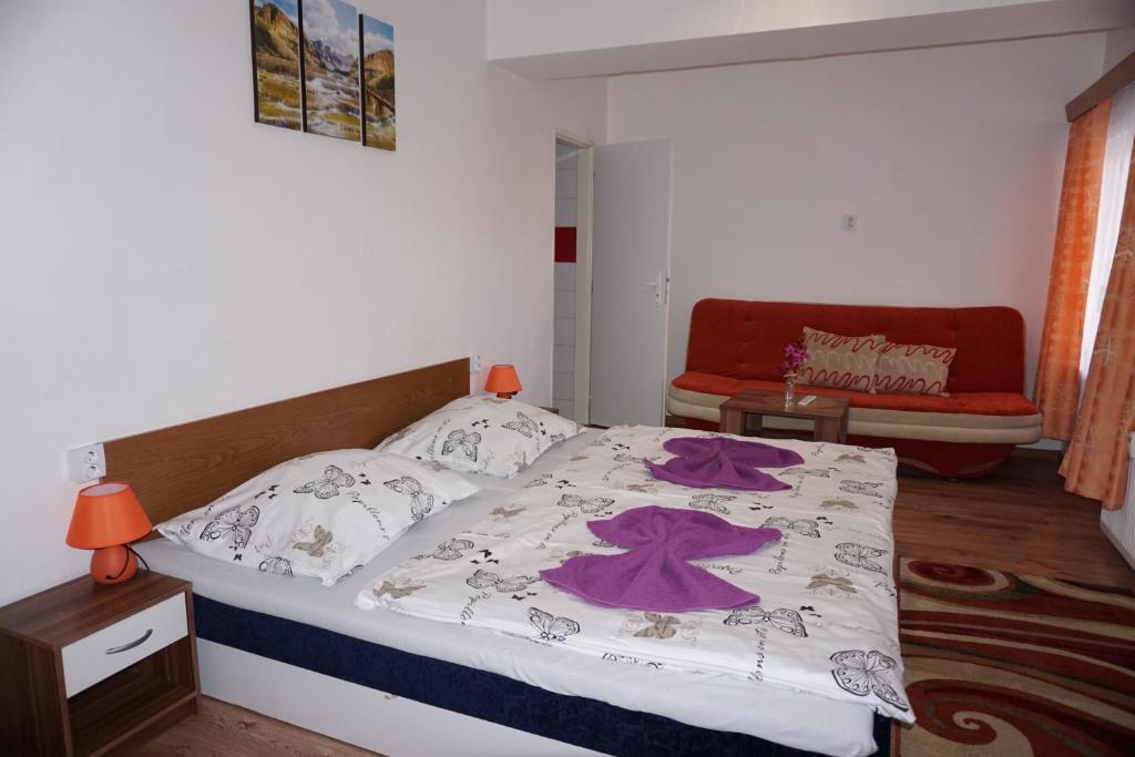 Postel nebo postele na pokoji v ubytování Hotel Guľa