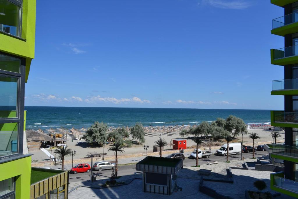 a view of the beach from a building at Sea and Pool View apt Spa n Pools beach resort in Mamaia Sat/Năvodari