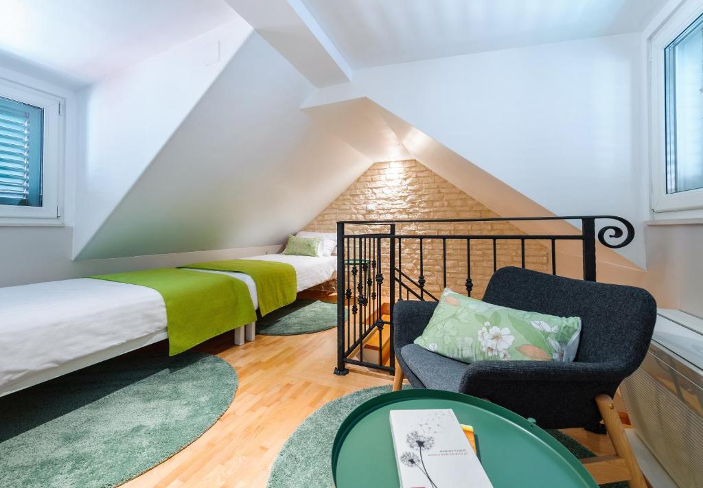 Posteľ alebo postele v izbe v ubytovaní Apartments Villa Mak