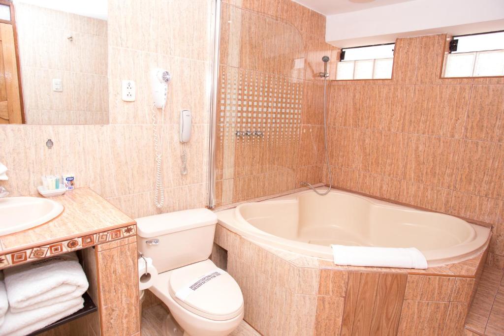 Koupelna v ubytování Hotel Arcangel