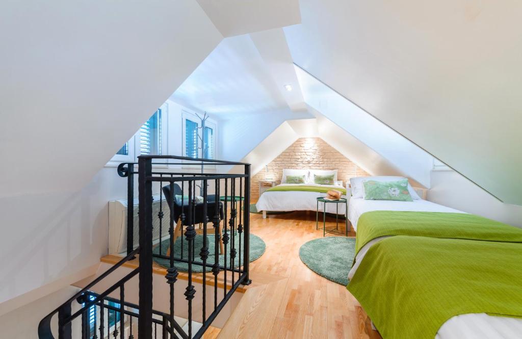 Posteľ alebo postele v izbe v ubytovaní Apartments Villa Mak