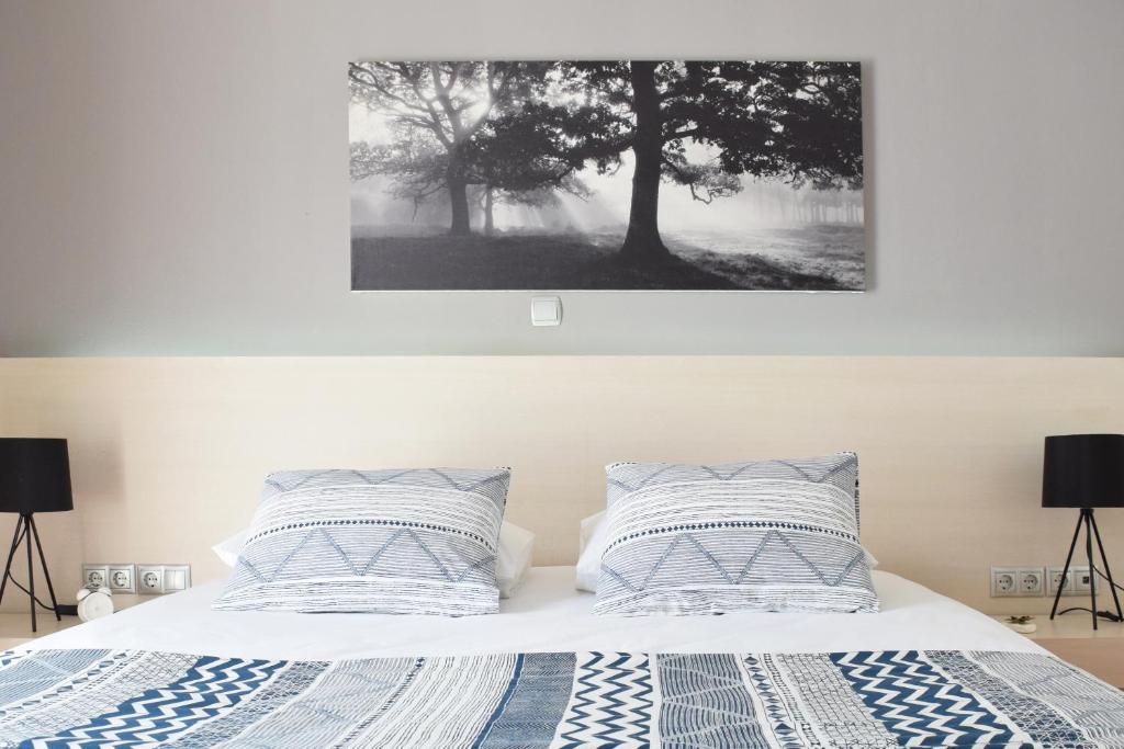 Postel nebo postele na pokoji v ubytování Poseidon by Heloni Apartments