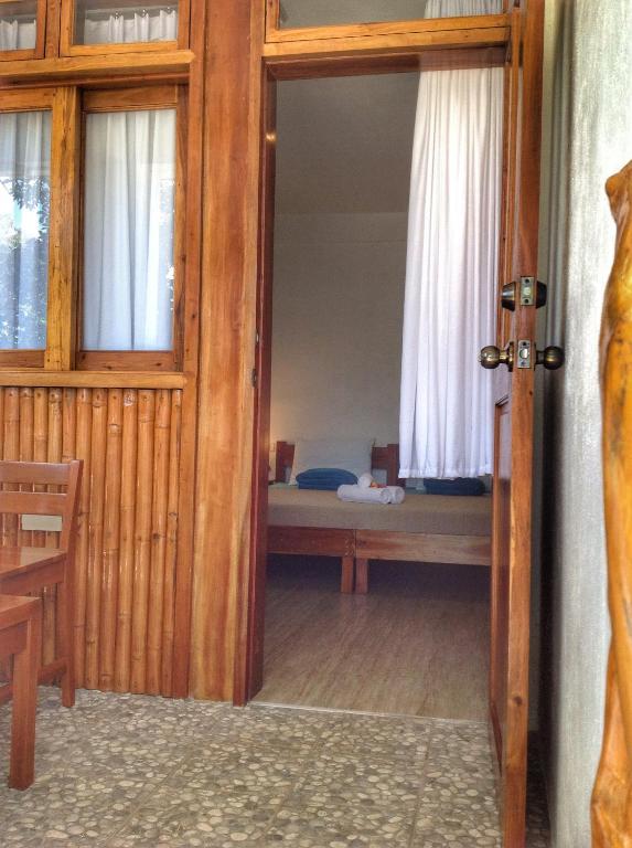 Postel nebo postele na pokoji v ubytování Pahiluna Guesthouse
