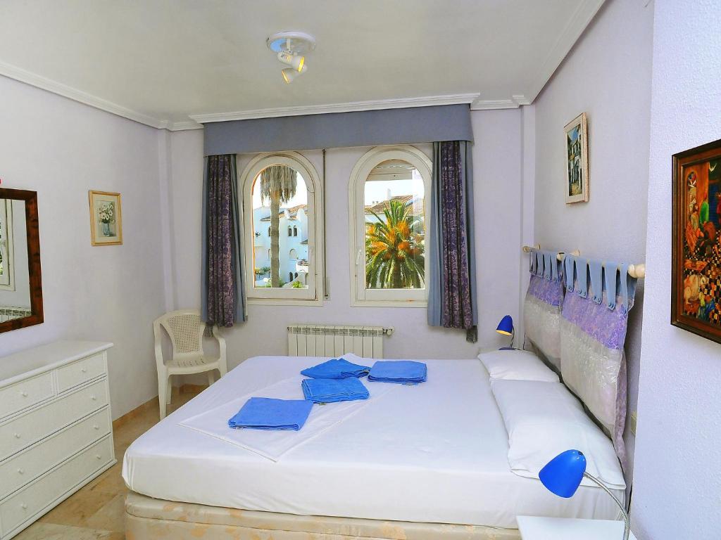A bed or beds in a room at Apartment San Esteban-1 by Interhome