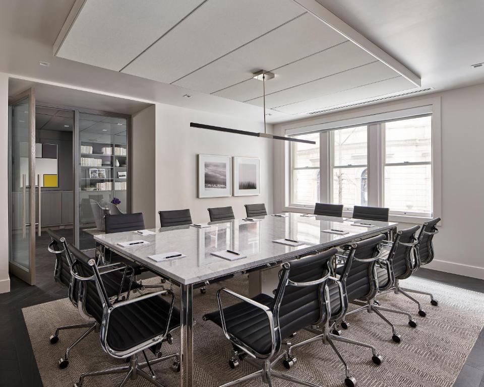 a conference room with a long table and chairs at AKA Rittenhouse Square in Philadelphia