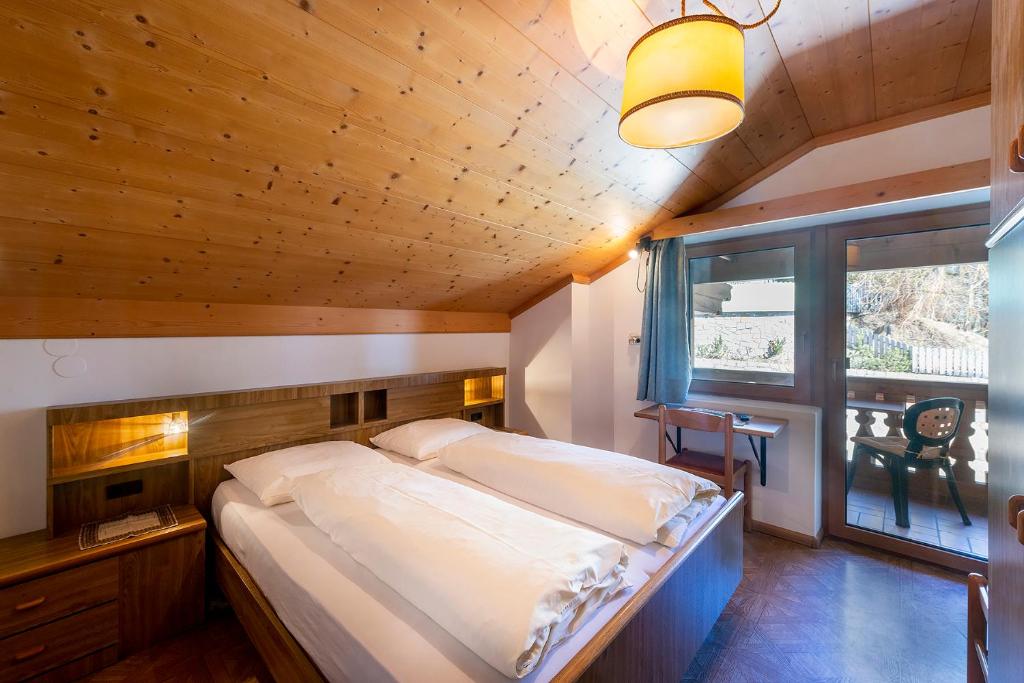 Postel nebo postele na pokoji v ubytování Gasthof Specker