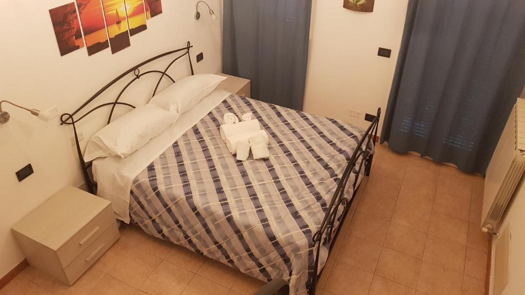 A bed or beds in a room at Vento di Grecale