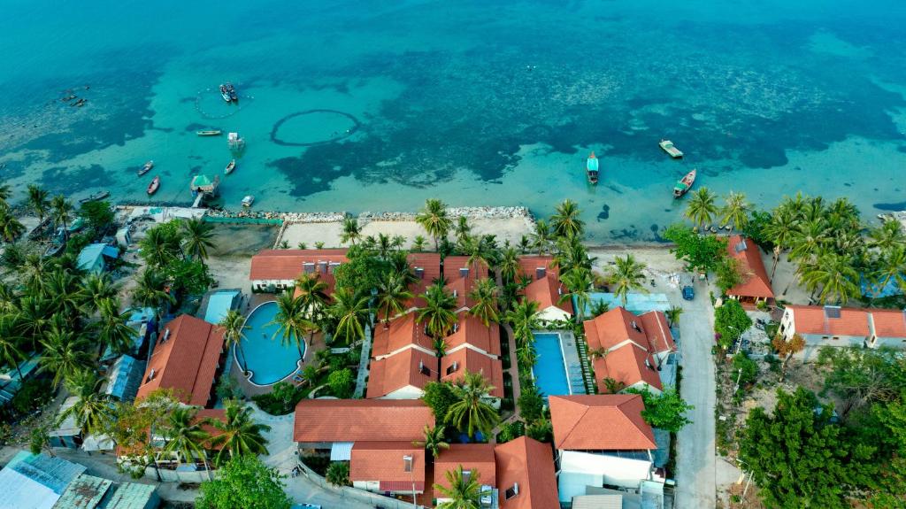 an aerial view of a resort near the water at Hula Hula Beachfront Phu Quoc in Phú Quốc