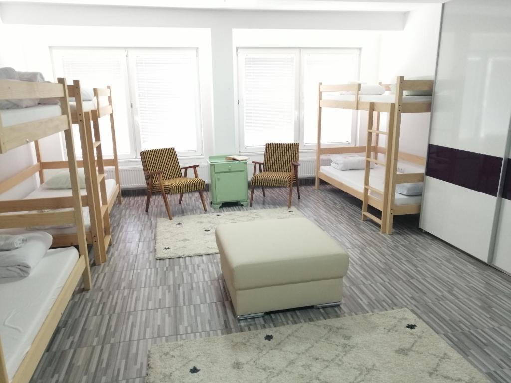 Postel nebo postele na pokoji v ubytování Hostel Eva