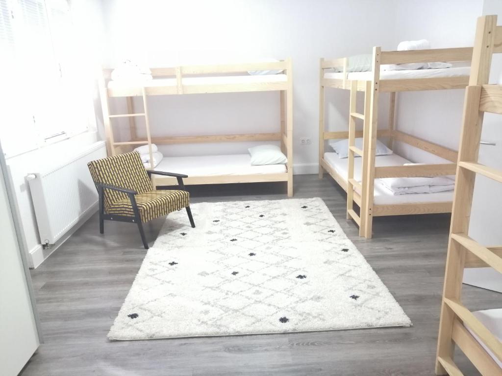 Postel nebo postele na pokoji v ubytování Hostel Eva