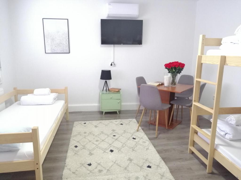 Postel nebo postele na pokoji v ubytování Hostel Eva