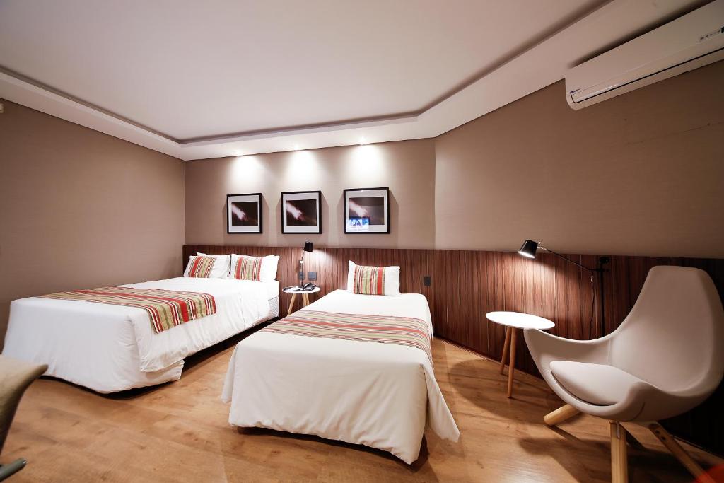 เตียงในห้องที่ Grand Hotel Royal Sorocaba by Atlantica