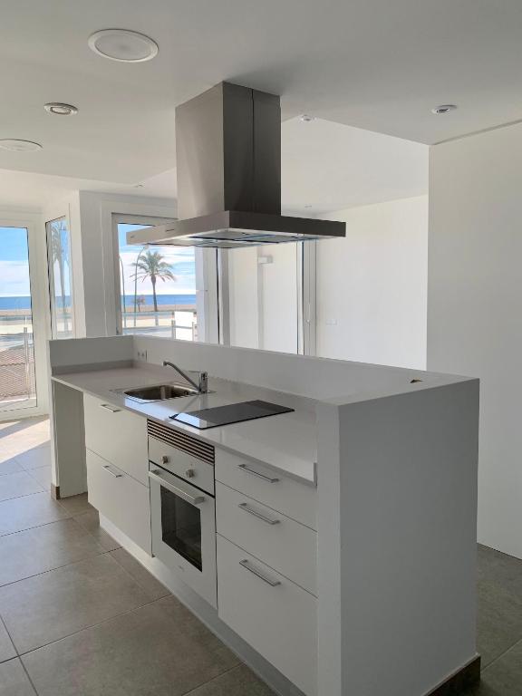 A kitchen or kitchenette at Edifici Valeria