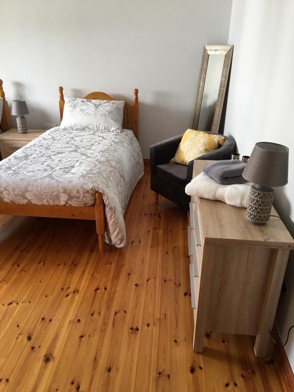 Postel nebo postele na pokoji v ubytování Colmán House