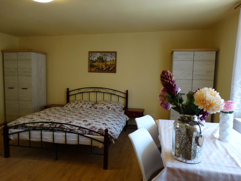 Postel nebo postele na pokoji v ubytování Apartmány Matilda