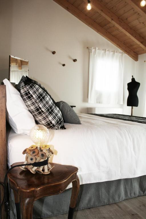 Postel nebo postele na pokoji v ubytování B&B Rocambola