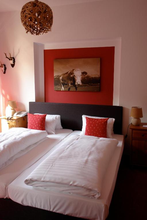 Postel nebo postele na pokoji v ubytování Hotel Gamshof
