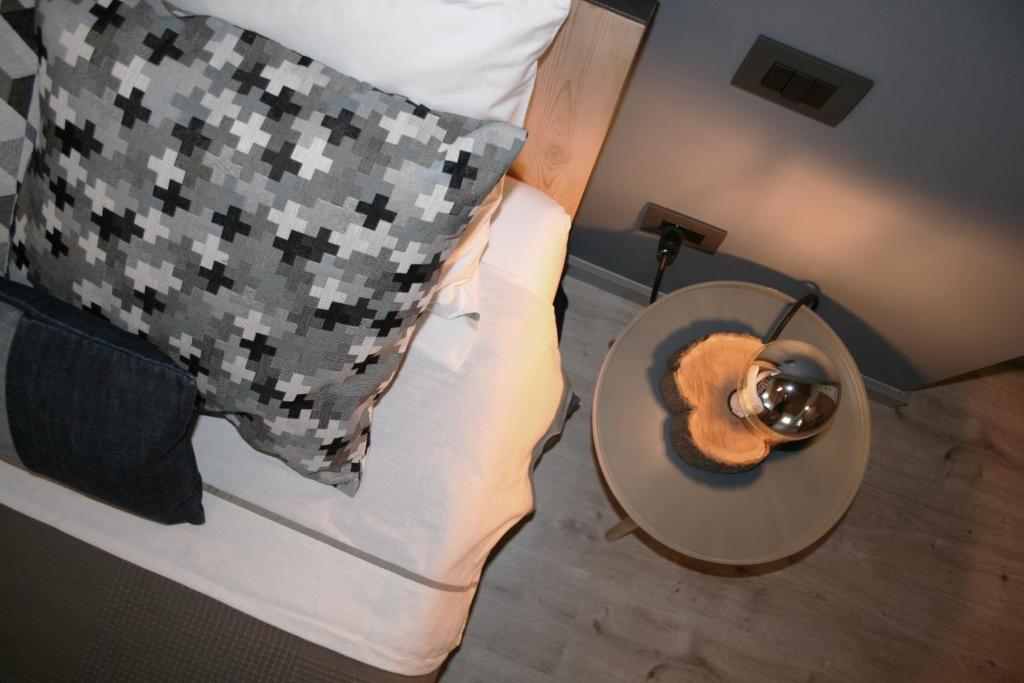 Postel nebo postele na pokoji v ubytování B&B Rocambola