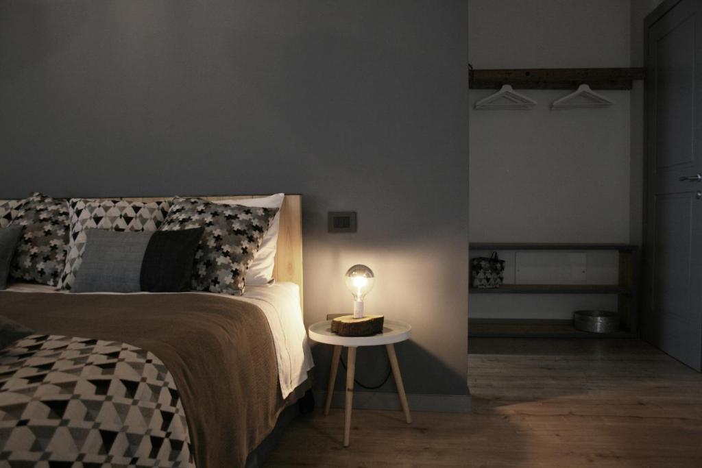 Postel nebo postele na pokoji v ubytování B&B Rocambola