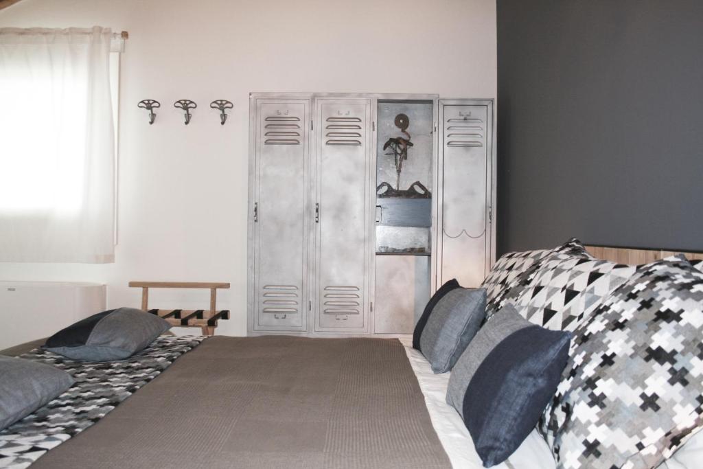 Postel nebo postele na pokoji v ubytování B&B Rocambola