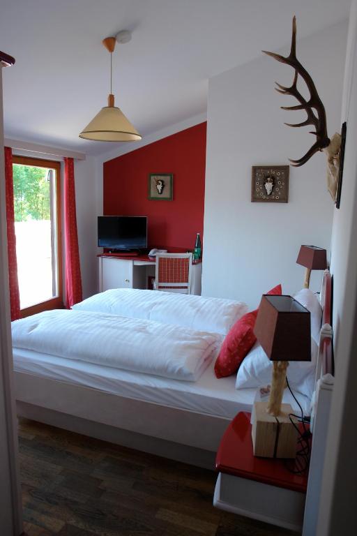 Postel nebo postele na pokoji v ubytování Hotel Gamshof