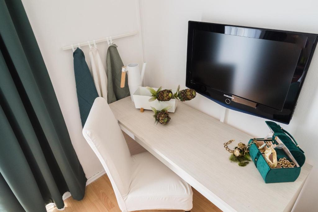 TV a/nebo společenská místnost v ubytování Guest house Lana