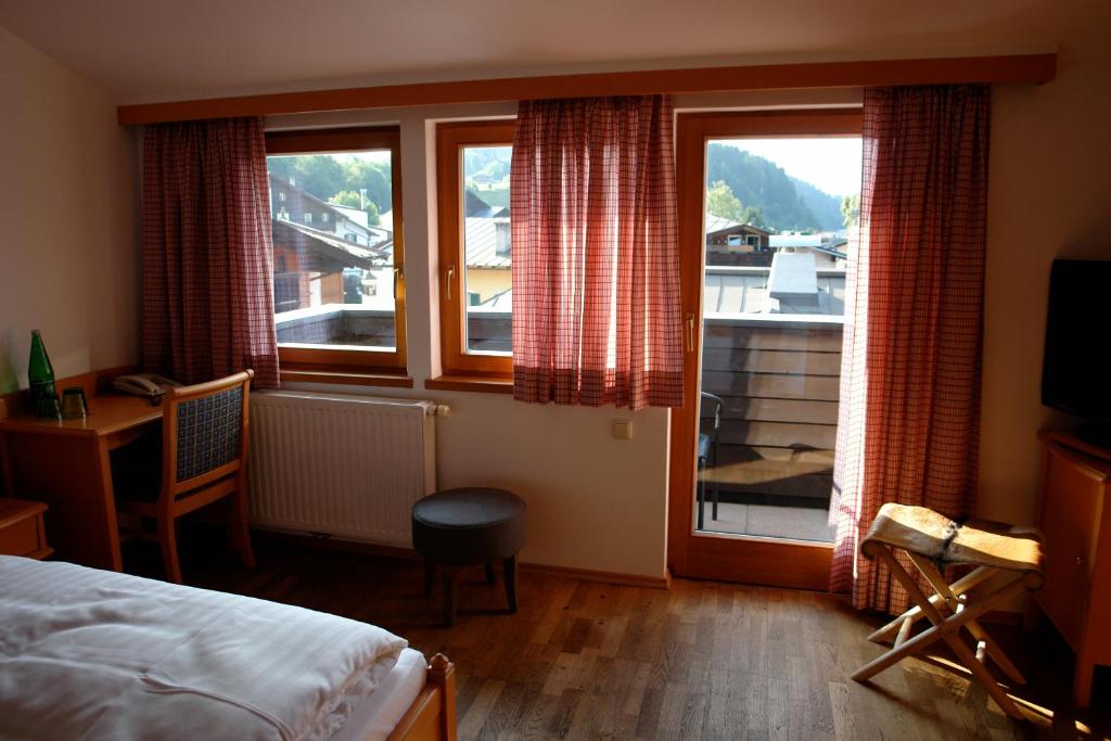 Postel nebo postele na pokoji v ubytování Hotel Gamshof