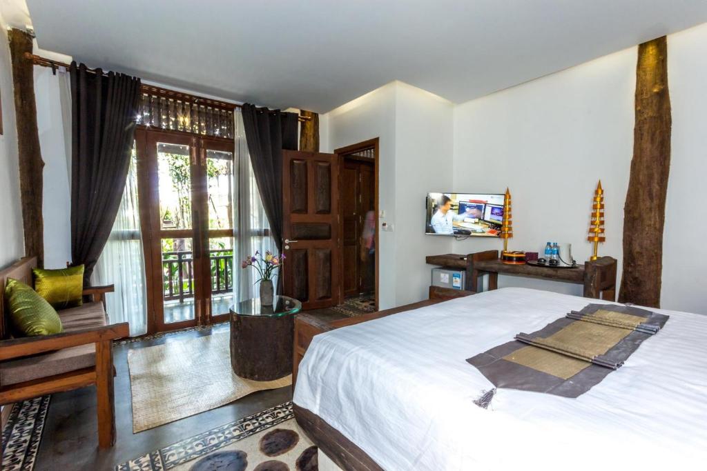TV a/nebo společenská místnost v ubytování Khmer Paradise Villa