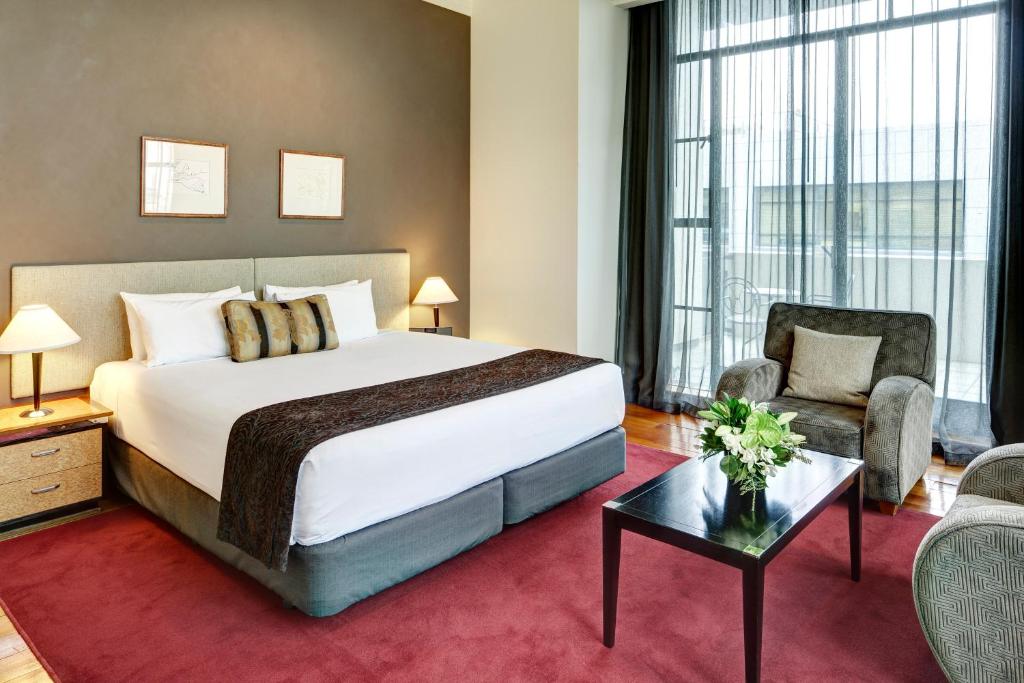 Ένα ή περισσότερα κρεβάτια σε δωμάτιο στο Rendezvous Heritage Hotel Auckland
