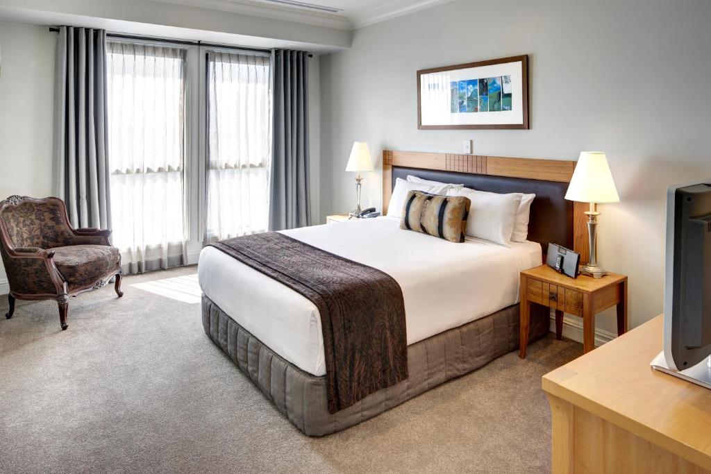 Ένα ή περισσότερα κρεβάτια σε δωμάτιο στο Rendezvous Heritage Hotel Auckland