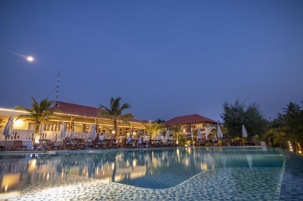 Bazén v ubytování Cassia Cottage Resort and Spa nebo v jeho okolí