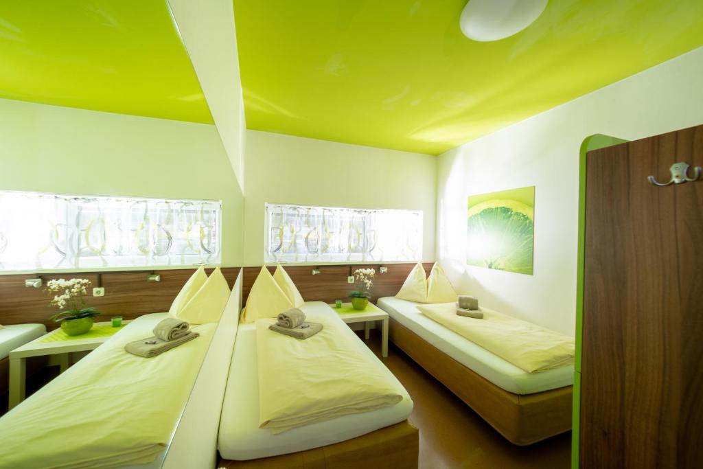 Postel nebo postele na pokoji v ubytování Hotel Greenrooms