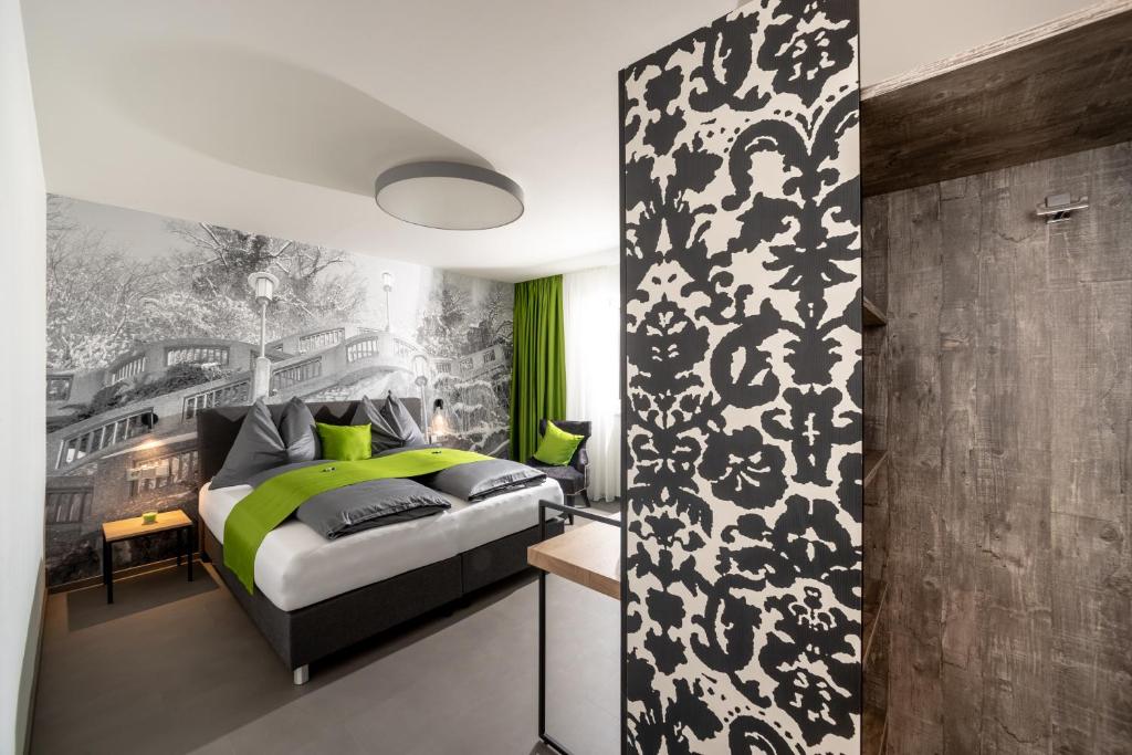 Postel nebo postele na pokoji v ubytování Hotel Greenrooms