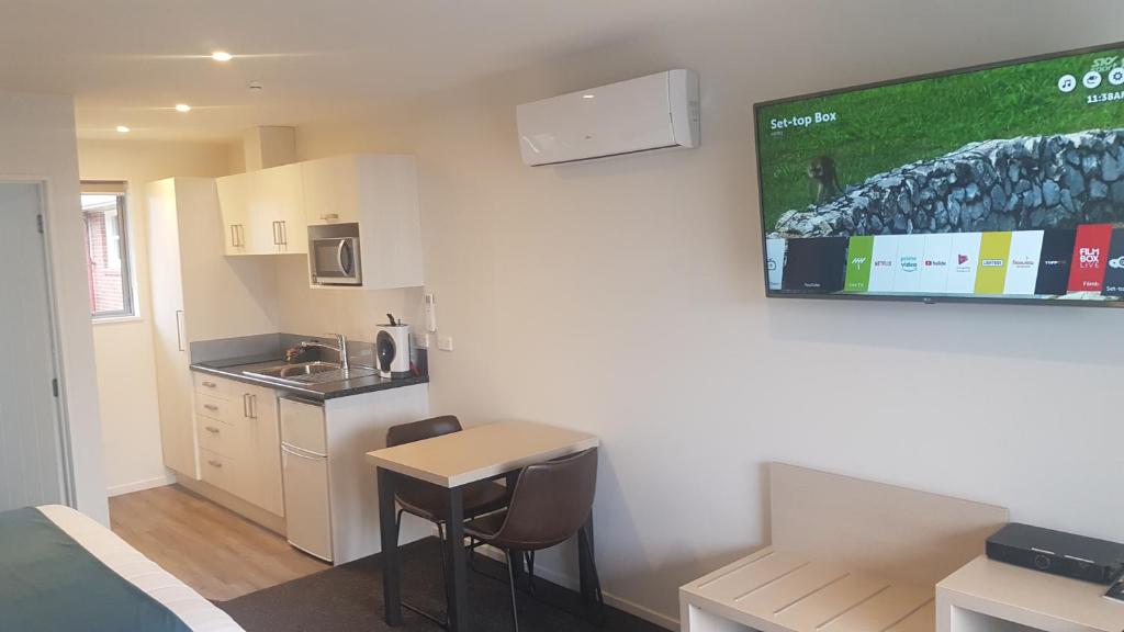 Kuchyň nebo kuchyňský kout v ubytování Taylors Motel