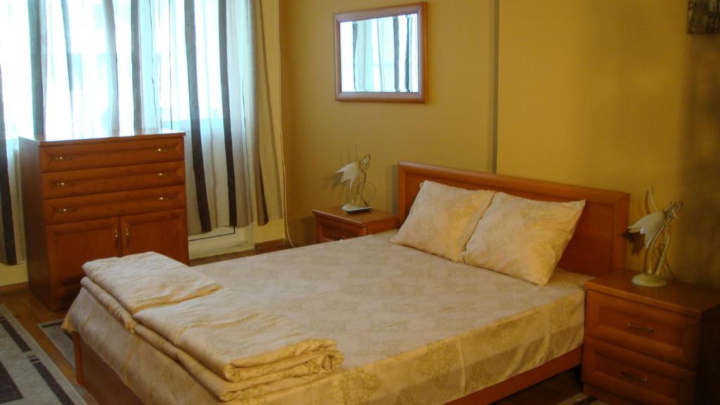 Postel nebo postele na pokoji v ubytování Apartment SOFIA Center