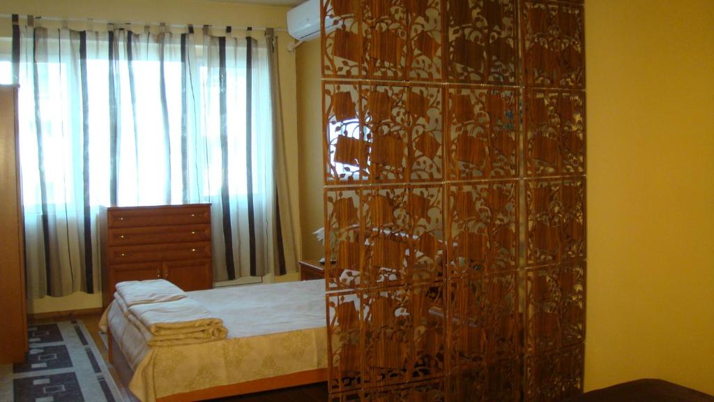 Postel nebo postele na pokoji v ubytování Apartment SOFIA Center