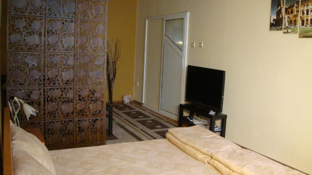 Postel nebo postele na pokoji v ubytování Apartment SOFIA Center