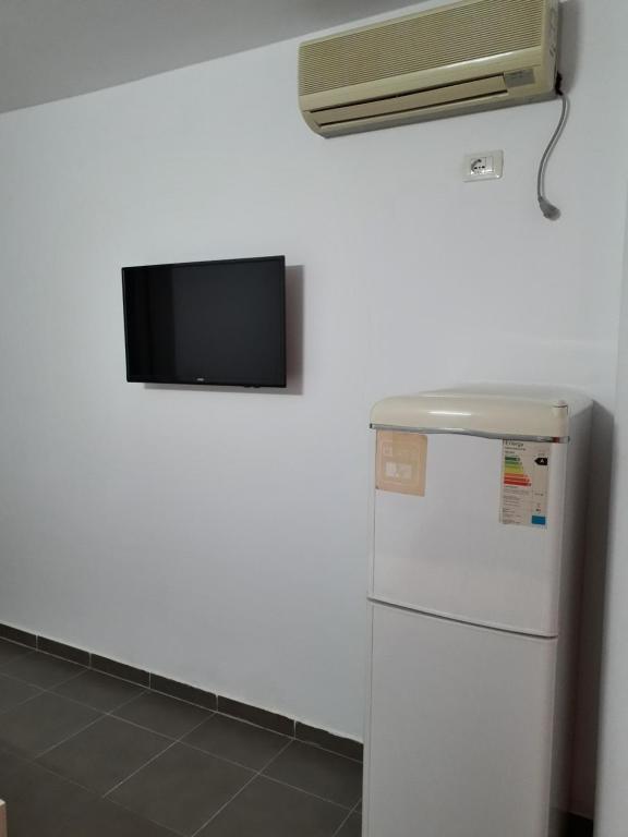 Kuchyň nebo kuchyňský kout v ubytování Rooms and Apartments Analipsi